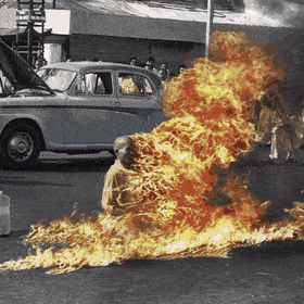 burning monk 74